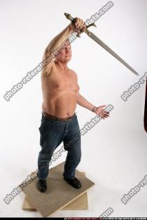 old-barbarian-defending-sword