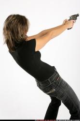 Woman Adult Average White Fighting with gun Standing poses Casual