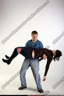 2009 02 MAN CARRYING WOUNDED WOMAN 01.jpg