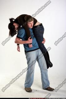 2009 02 MAN CARRYING WOUNDED WOMAN 03.jpg