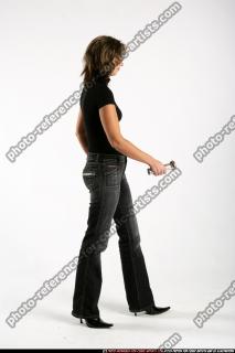 woman-searching-light-revolver