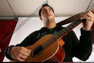 Jacob_White-plays-guitar