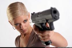 Woman Adult Athletic White Fighting with gun Detailed photos Sportswear