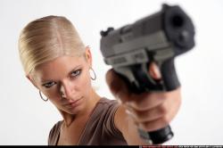 Woman Adult Athletic White Fighting with gun Detailed photos Sportswear