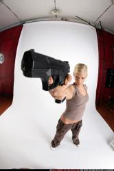 Woman Adult Athletic White Fighting with gun Detailed photos Sportswear