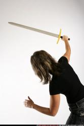 Woman Adult Average White Fighting with sword Standing poses Casual