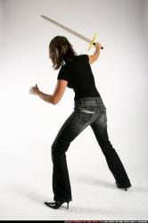 Woman Adult Average White Fighting with sword Standing poses Casual