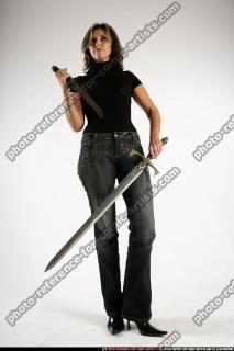 Andria-standing-double-knives