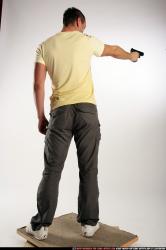 Man Adult Athletic White Fighting with gun Standing poses Sportswear