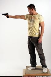 Man Adult Athletic White Fighting with gun Standing poses Sportswear