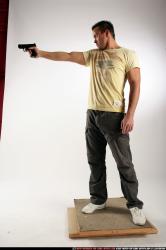 Man Adult Athletic White Fighting with gun Standing poses Sportswear