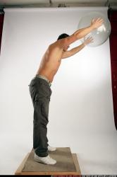 Man Adult Athletic White Throwing Standing poses Pants