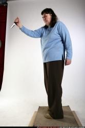 Woman Old Chubby White Fighting with knife Standing poses Casual