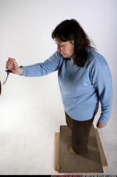 Woman Old Chubby White Fighting with knife Standing poses Casual