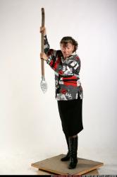 Woman Old Average White Fighting with spear Standing poses Casual