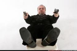 Man Old Chubby White Fighting with gun Laying poses Casual