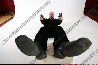 Matej-dual-guns-pose1