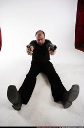 Man Old Chubby White Fighting with gun Laying poses Casual