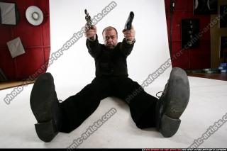 Matej-dual-guns-pose1