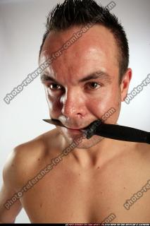 johnny-knife-in-mouth