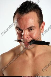 johnny-knife-in-mouth