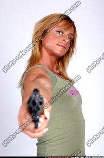 JANNIE-WOMAN-AIMING-REVOLVER