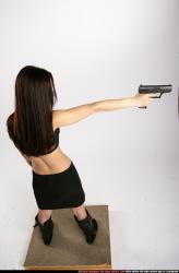 Woman Young Athletic White Fighting with gun Standing poses Sportswear