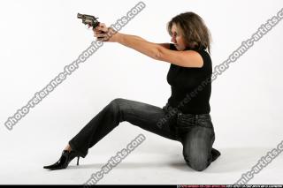 Andria-kneeling-revolver