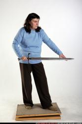 Woman Old Chubby White Fighting with sword Standing poses Casual