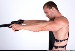 Man Adult Muscular White Fighting with gun Standing poses Casual