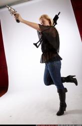 Woman Young Athletic White Fighting with gun Standing poses Casual