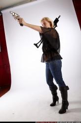 Woman Young Athletic White Fighting with gun Standing poses Casual