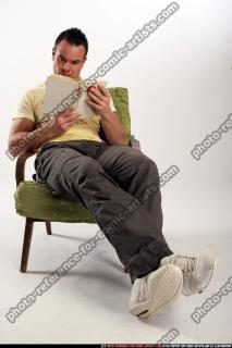 2010 01 JOHNNY SITTING READING 01.jpg