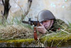 Man Adult Average White Fighting with rifle Laying poses Army