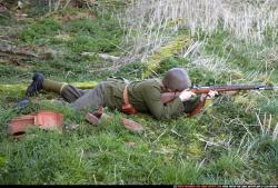 Man Adult Average White Fighting with rifle Laying poses Army