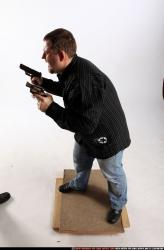 Man Adult Chubby White Fighting with gun Standing poses Casual