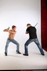 Young Athletic White Fighting with sword Standing poses Sportswear Men