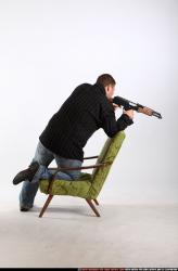 Man Adult Chubby White Fighting with submachine gun Kneeling poses Casual