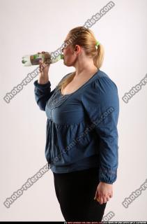 2010 05 BRITNEY STANDING DRINKING BOTTLE 02