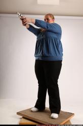 Woman Adult Chubby White Fighting with gun Standing poses Casual