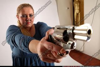 2010 07 BRITNEY STANDING AIMING PISTOL 11