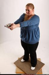 Woman Adult Chubby White Fighting with gun Standing poses Casual