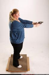 Woman Adult Chubby White Fighting with gun Standing poses Casual