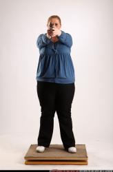 Woman Adult Chubby White Fighting with gun Standing poses Casual