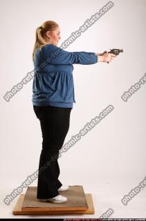 britney-standing-aiming-pistol