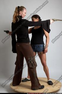 women-aiming-guns