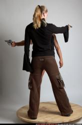 Adult Muscular White Fighting with gun Standing poses Casual
