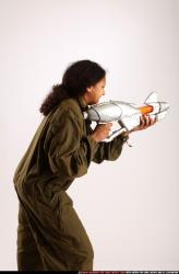 Woman Young Athletic Black Fighting with submachine gun Standing poses Army