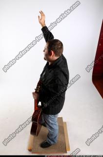 daniel-guitar-singer-waving