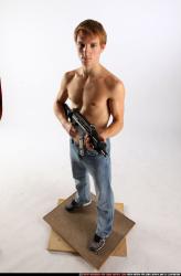 Man Young Athletic White Fighting with submachine gun Standing poses Pants